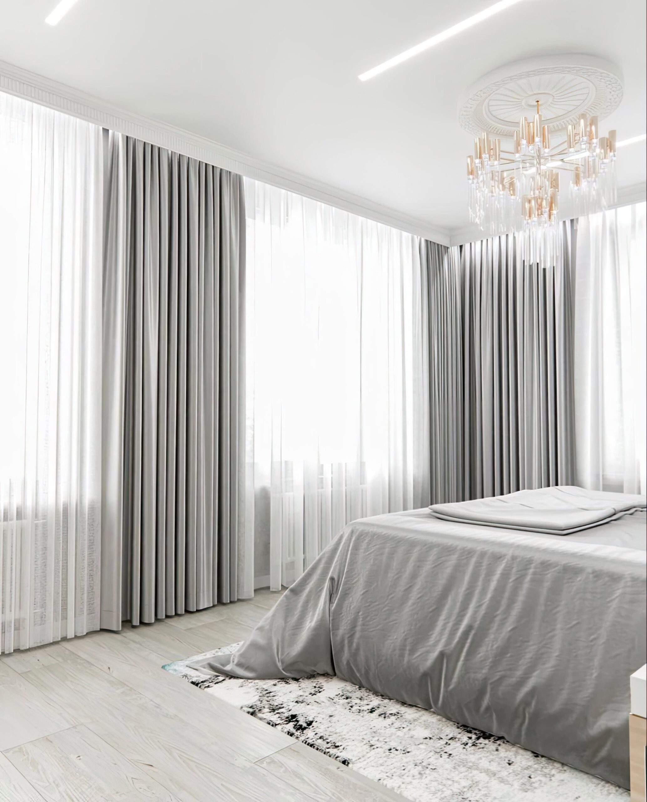 bedroom-with-bed-chandelier-hanging-from-ceiling (1)
