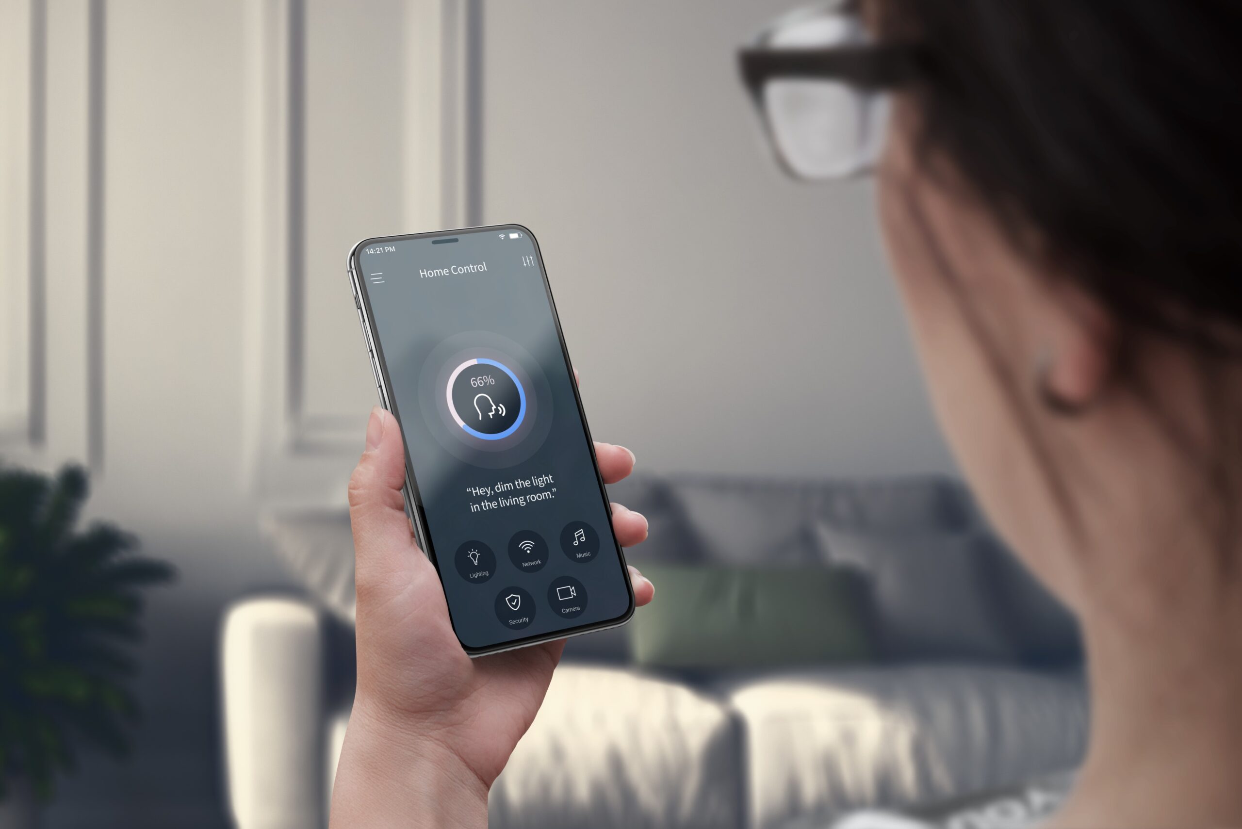 voicecontrolled-lighting-management-modern-home-woman-uses-her-phone-adjust-ambiance-effortlessly-living-room (1)